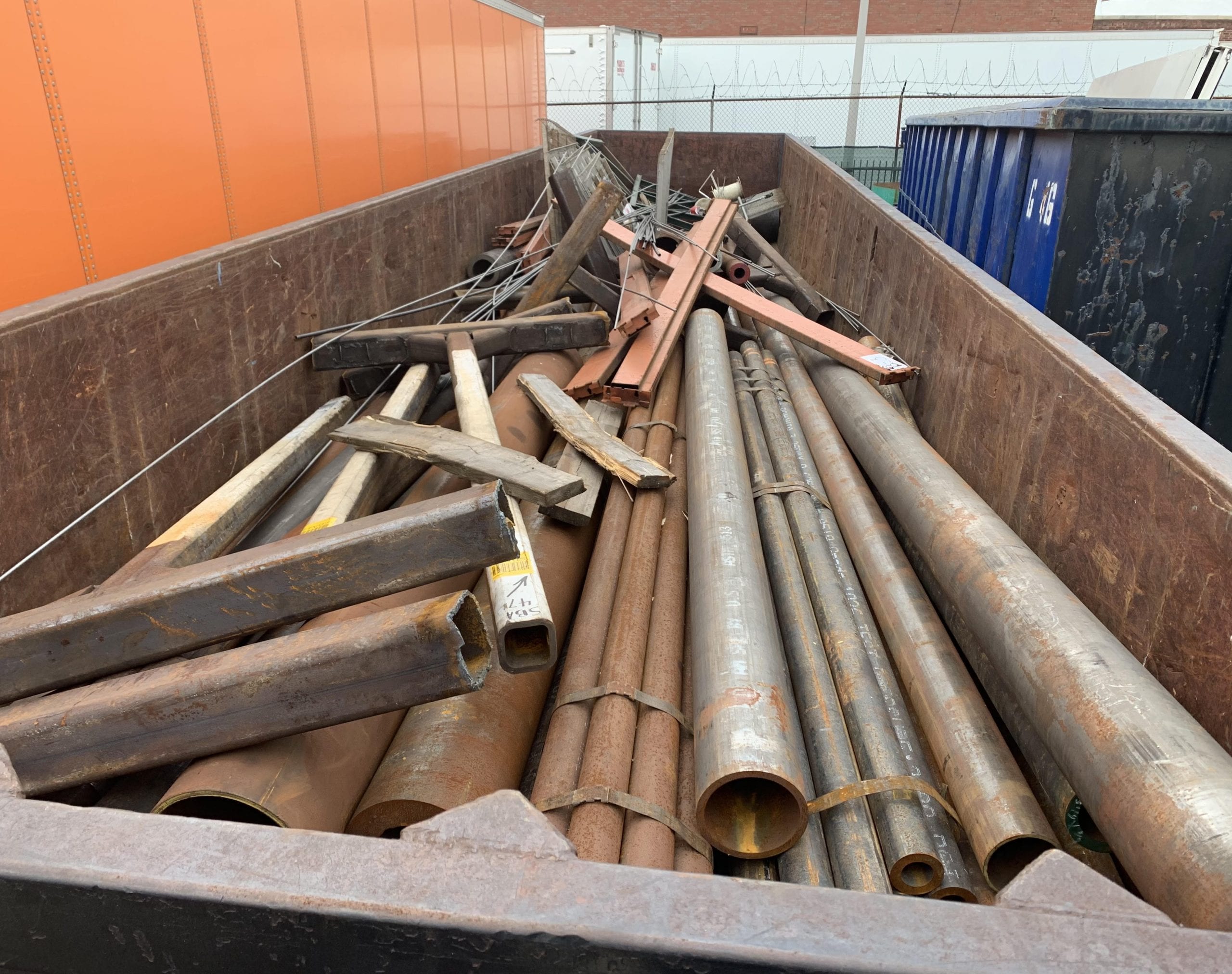 Scrap tubing stacked on gondola trailer awaiting recycling at Greenway Metal facility