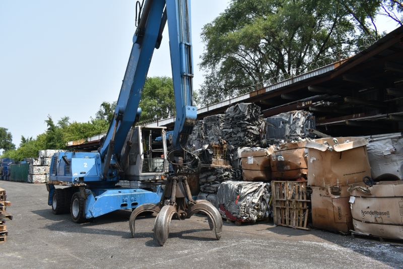 large crane in metal scrap yard